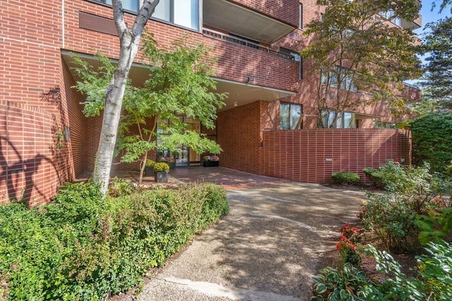 77 Adams St Unit 109, Quincy, MA 02169 - view of home's exterior featuring brick siding