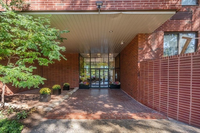 77 Adams St Unit 109, Quincy, MA 02169 - doorway to property with brick siding