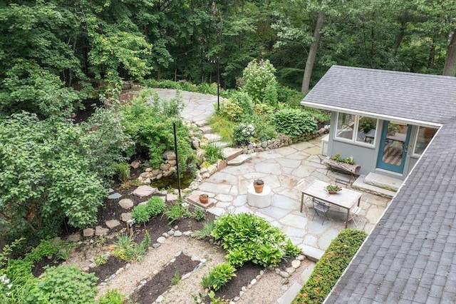 5 Mason St, Lexington, MA 02421 - view of patio featuring an outbuilding