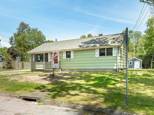 37 Evergreen, Fairhaven, MA 02719 - view of front of home featuring a shingled roof and a chimney