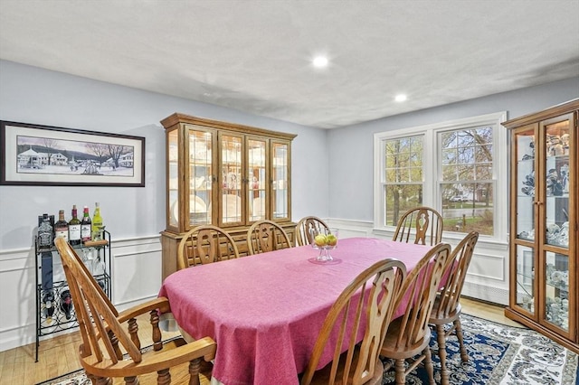 1 Island Rd, Medway, MA 02053 - dining room featuring wainscoting, light wood-type flooring, recessed lighting, and a decorative wall
