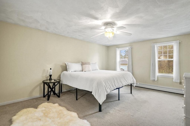 1 Island Rd, Medway, MA 02053 - carpeted bedroom featuring a baseboard radiator, multiple windows, baseboards, and ceiling fan