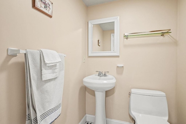 1 Island Rd, Medway, MA 02053 - bathroom with toilet, baseboards, and a sink