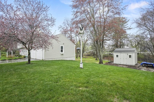 1 Island Rd, Medway, MA 02053 - view of grassy yard featuring a shed and an outbuilding