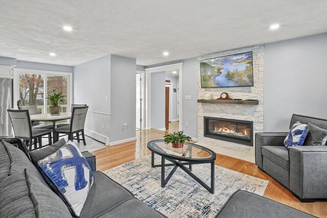 1 Island Rd, Medway, MA 02053 - living area featuring a fireplace, light wood-style flooring, recessed lighting, and baseboards