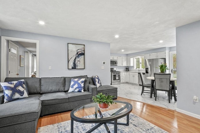 1 Island Rd, Medway, MA 02053 - living room featuring recessed lighting, baseboards, and light wood-type flooring