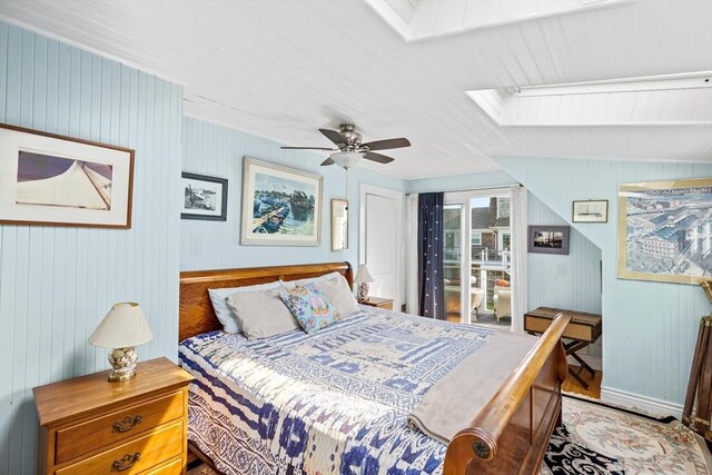 bedroom featuring ceiling fan and a skylight