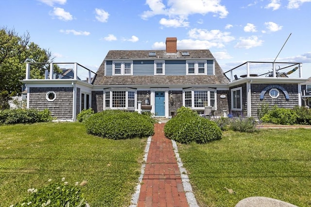 view of front facade with a front yard