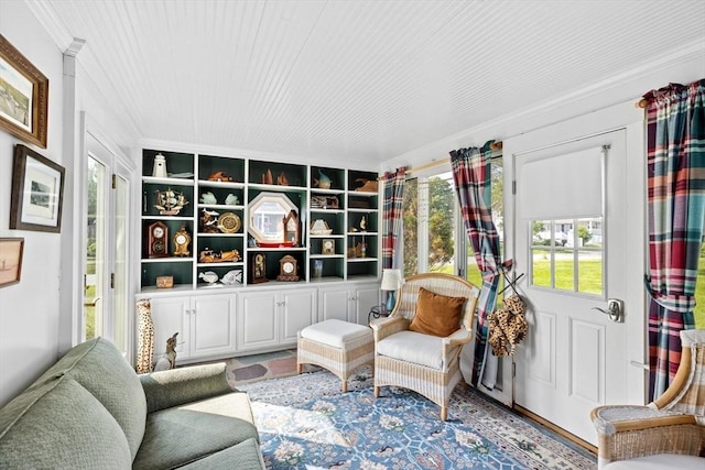 sitting room featuring ornamental molding