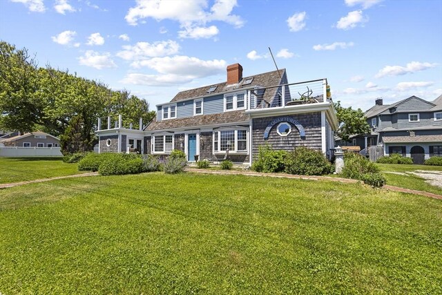 view of front of house with a front lawn