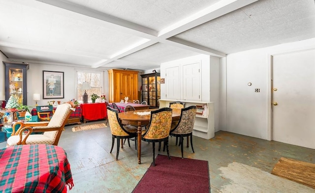 dining room featuring concrete flooring