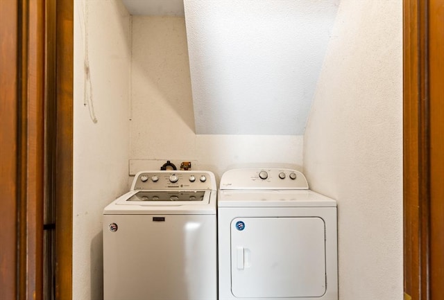 laundry area with laundry area and independent washer and dryer