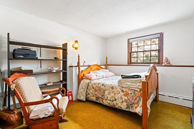 carpeted bedroom featuring a baseboard radiator and a textured ceiling