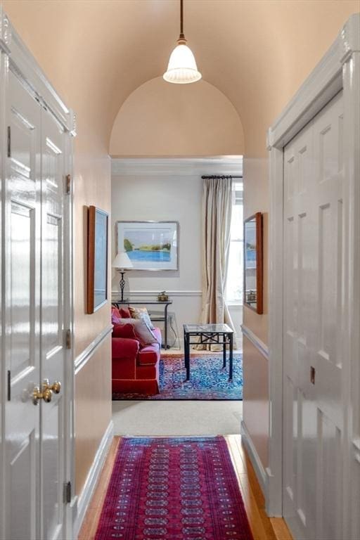 151 Beacon St Unit 4, Boston, MA 02116 - corridor featuring vaulted ceiling and baseboards