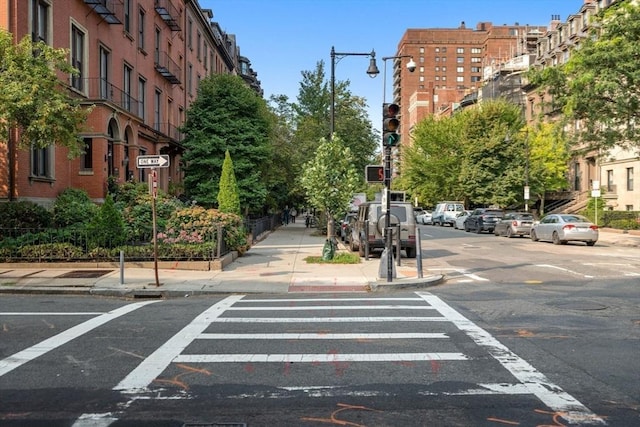 151 Beacon St Unit 4, Boston, MA 02116 - view of asphalt street with sidewalks, curbs, street lights, and traffic lights