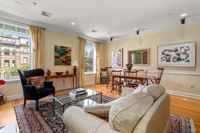 151 Beacon St Unit 4, Boston, MA 02116 - living area with light wood-type flooring, baseboards, recessed lighting, and ornamental molding