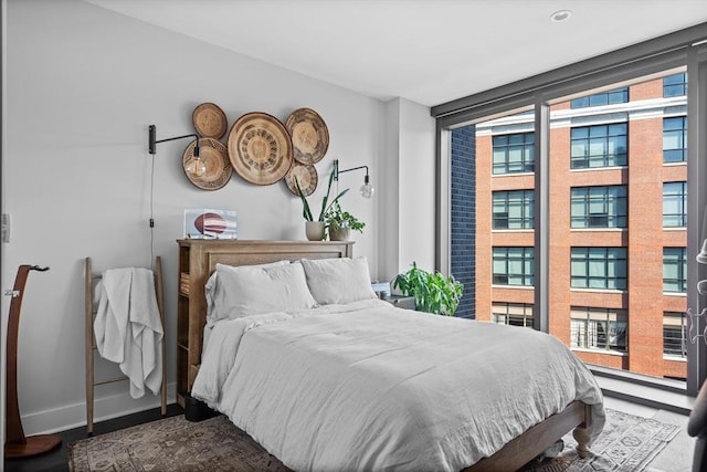 14 W Broadway Unit 703, Boston, MA 02127 - bedroom with multiple windows and baseboards