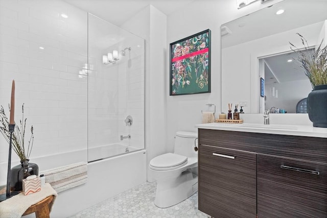 14 W Broadway Unit 703, Boston, MA 02127 - bathroom featuring vanity, toilet, combined bath / shower with glass door, tile patterned floors, and recessed lighting