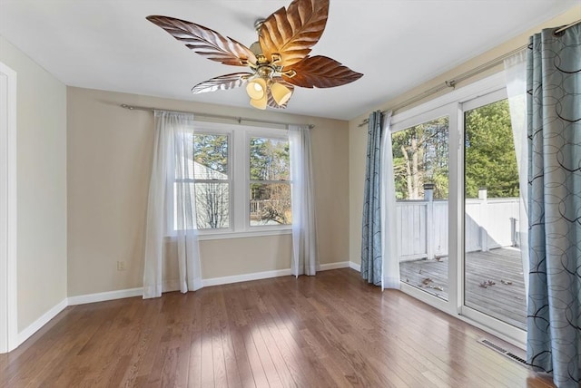 interior space featuring hardwood / wood-style flooring and ceiling fan