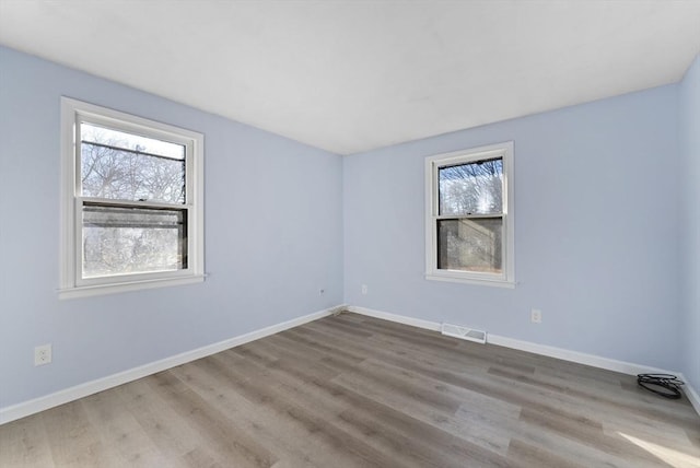 empty room featuring light wood-type flooring