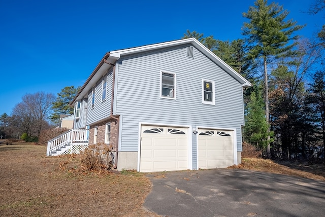 view of home's exterior featuring a garage