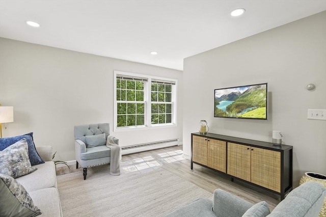 459 Brook St Unit C, Clinton, MA 01510 - living area with baseboard heating, recessed lighting, and light wood-style flooring