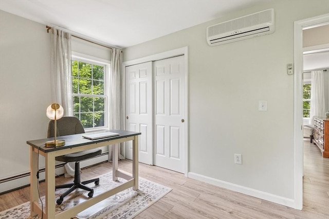 459 Brook St Unit C, Clinton, MA 01510 - office with an AC wall unit and light wood finished floors