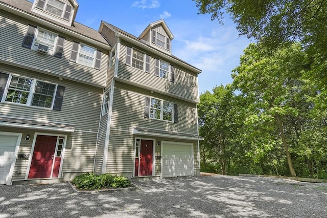 459 Brook St Unit C, Clinton, MA 01510 - view of front of property featuring gravel driveway and an attached garage