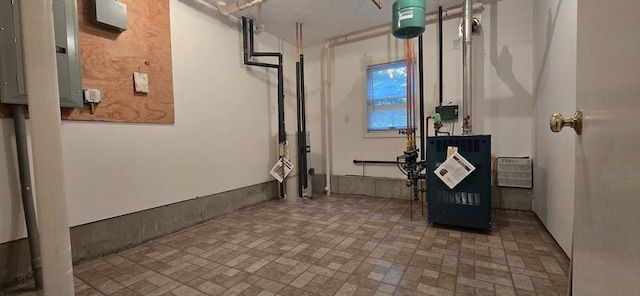 459 Brook St Unit C, Clinton, MA 01510 - below grade area featuring electric panel and brick patterned floors