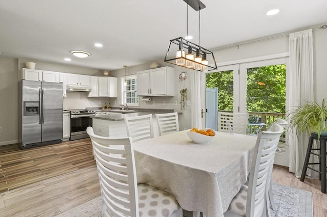 459 Brook St Unit C, Clinton, MA 01510 - dining room with light wood-style floors and recessed lighting