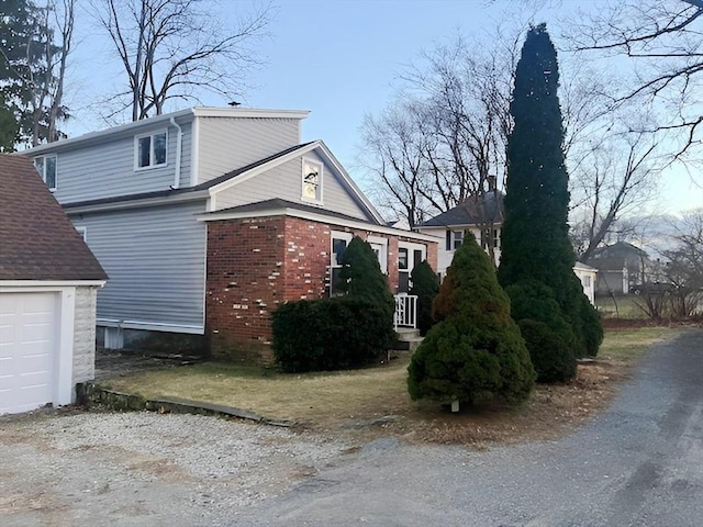 view of home's exterior featuring a garage