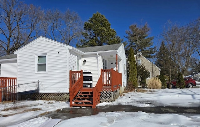 view of front of property with a deck