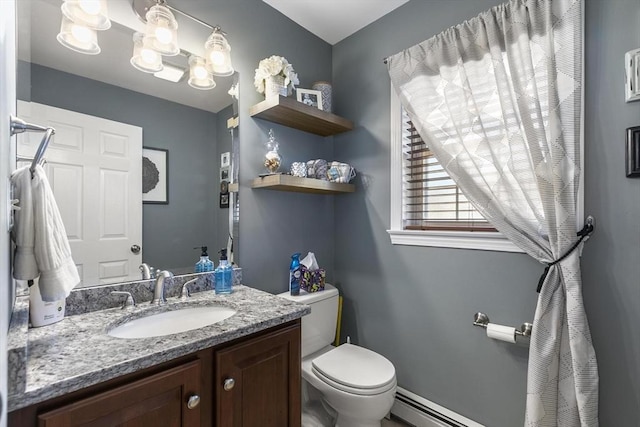 16 Windsor St, Everett, MA 02149 - bathroom featuring toilet, vanity, and baseboard heating