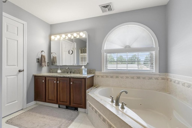16 Windsor St, Everett, MA 02149 - full bath with vanity, a whirlpool tub, and tile patterned floors