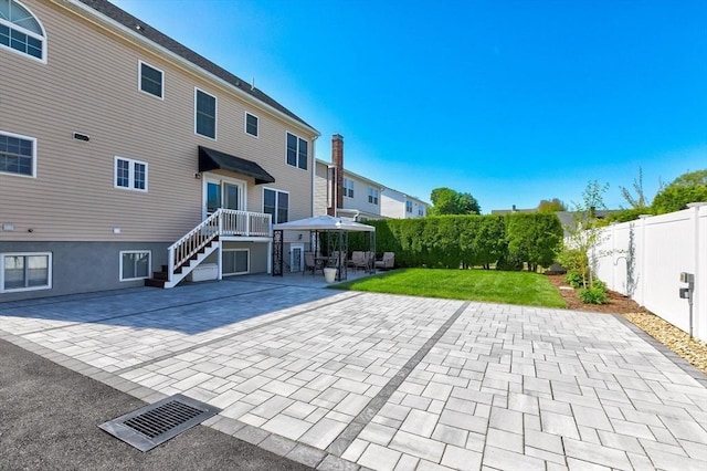 16 Windsor St, Everett, MA 02149 - back of house featuring a patio area