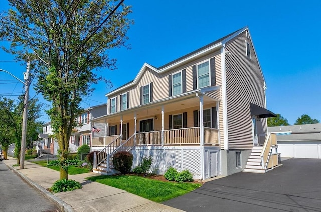 16 Windsor St, Everett, MA 02149 - view of front of home featuring covered porch and stairway