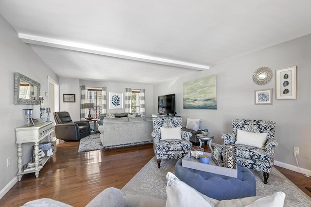 16 Windsor St, Everett, MA 02149 - living room featuring beam ceiling, wood finished floors, and baseboards