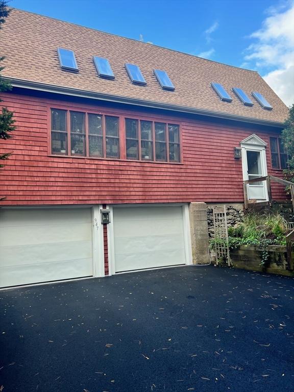 exterior space with a garage