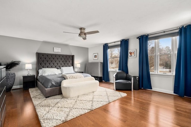 bedroom featuring ceiling fan and wood-type flooring