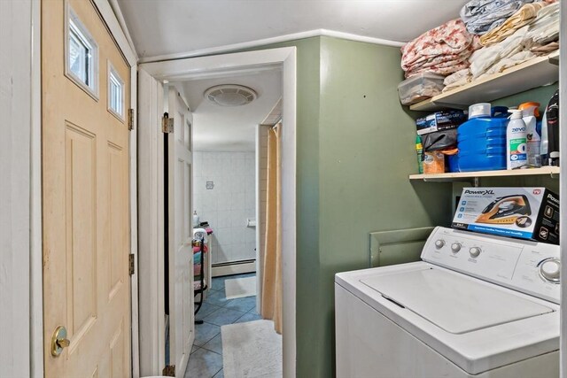 laundry area with laundry area, visible vents, washer / clothes dryer, tile patterned floors, and a baseboard heating unit