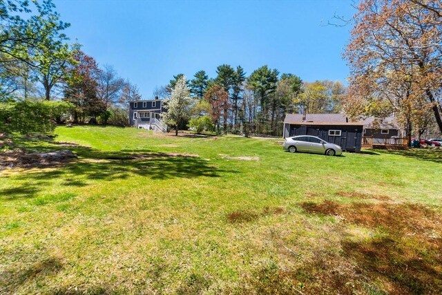 view of yard with a deck