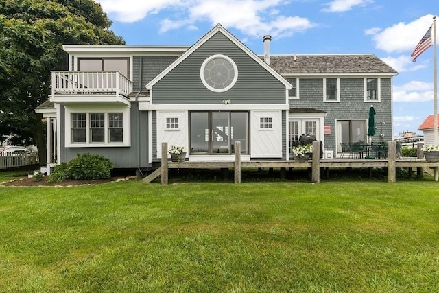 107 Channel Point Rd, Barnstable, MA 02601 - rear view of house featuring a balcony, a lawn, a deck, and roof with shingles