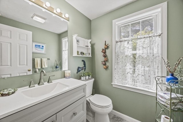 2 Englewood Dr Unit Jl, Harwich, MA 02645 - bathroom featuring toilet, vanity, and baseboards