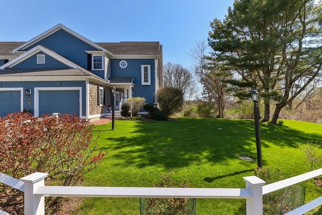 2 Englewood Dr Unit Jl, Harwich, MA 02645 - view of front of home with a garage and roof with shingles