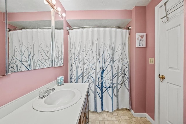 2 Englewood Dr Unit Jl, Harwich, MA 02645 - full bathroom with vanity, baseboards, tile patterned floors, and a shower with shower curtain