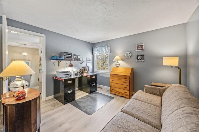 2 Englewood Dr Unit Jl, Harwich, MA 02645 - office area with wood finished floors, baseboards, and a chandelier