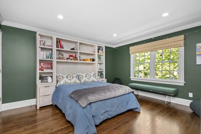 bedroom with baseboards, recessed lighting, crown molding, and wood finished floors