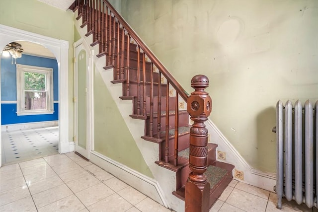 24 N Byron Ave, Brockton, MA 02301 - staircase with radiator and tile patterned flooring