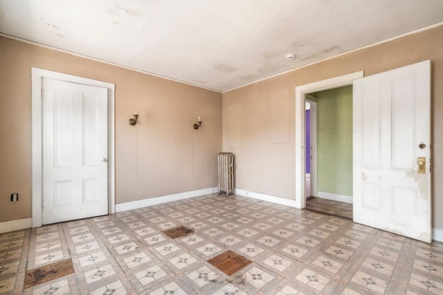 24 N Byron Ave, Brockton, MA 02301 - unfurnished room featuring radiator and light flooring