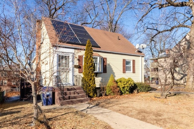 view of front of house with solar panels